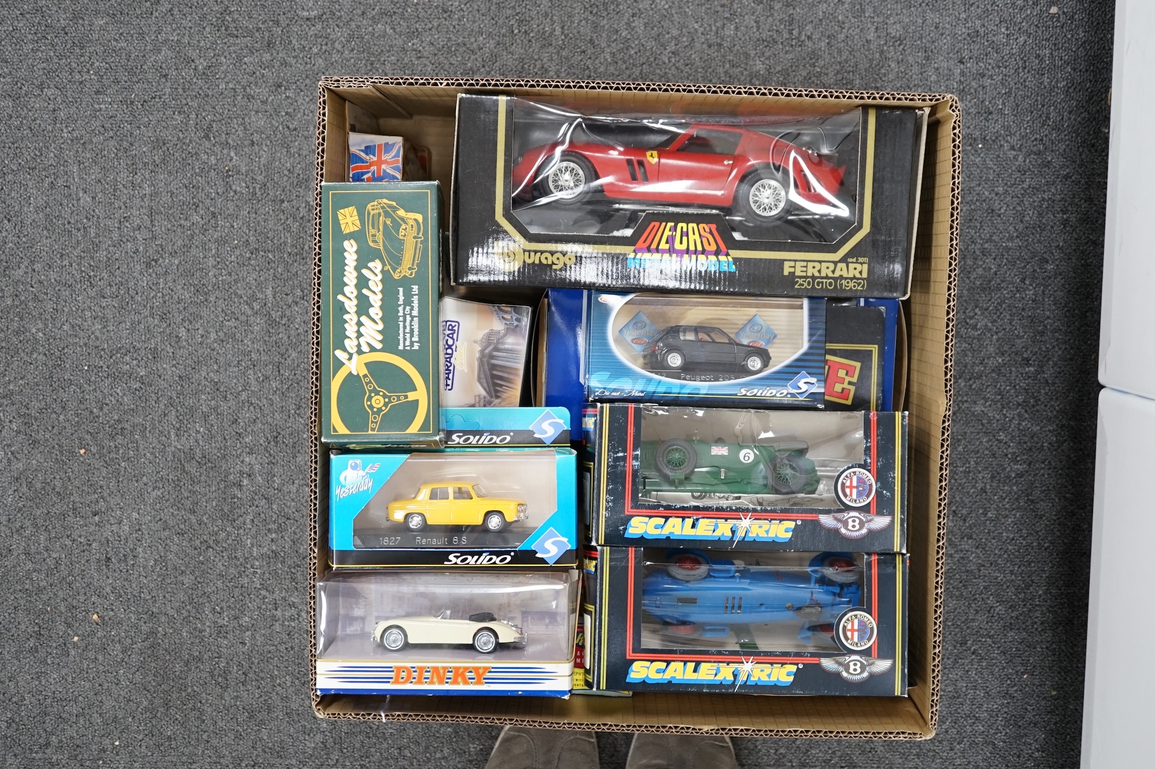 Twenty boxed diecast, white metal, etc. model vehicles including; a Lansdowne Models MG Saloon Type ‘YA’, and an unboxed S.M.T.S. white metal A.C. cobra, two Scalextric cars; a Bentley (C305) and an Alfa-Romeo (C306), th